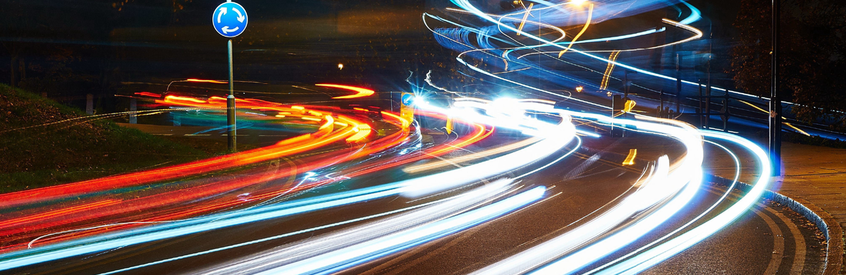 Night-time image of a busy road and traffic lights in a city - Traffic Light 